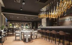 Wnętrza restauracji Capri projektu pracowni Tremend. Fot. Rockfon, Bartosz Makowski.