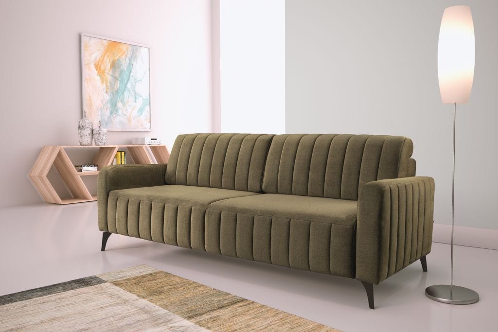 Kolor oliwkowy na sofie Grande firmy Libro nadaje jej charakter i elegancję. Wprowadza do wnętrza kolor i ożywia je. Kolor zielony może być bazą do ciekawych aranżacji, ponieważ komponuje się z innymi kolorami – odcieniami żółtego, pomarańczowego, brązu, fioletu, czerni i bieli oraz beżami, które obecnie przechodzą swoisty renesans.