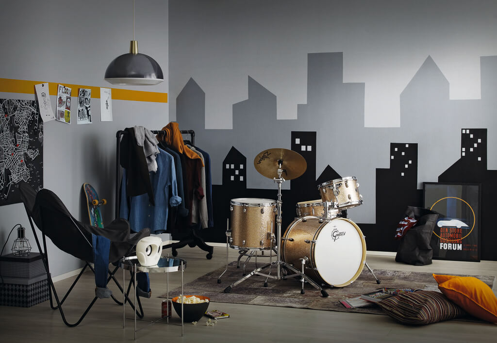 Jeśli mamy w domu aspirującego muzyka perkusistę, doskonałym tłem dla realizacji jego pasji będzie stworzenie ściany obrazującej wielkomiejskie wieżowce.