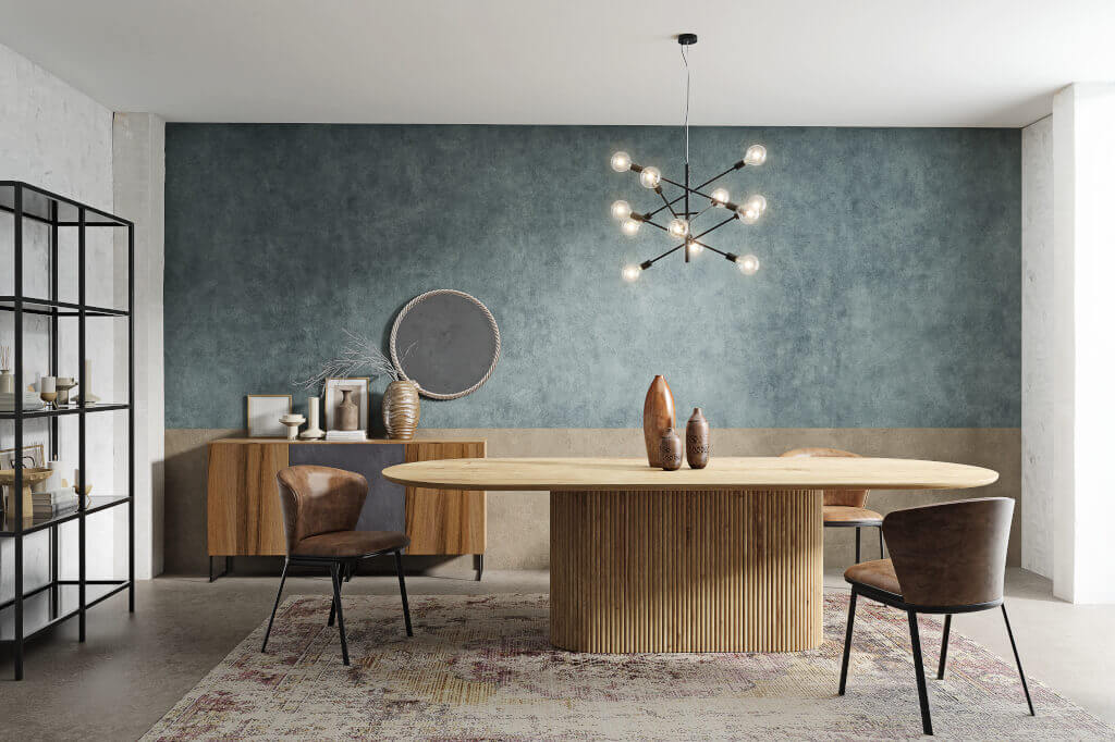 Drewniane stoły „Kalisto” marki Trebord charakteryzują się owalnym lub okrągłym kształtem, w zależności od wybranego blatu.