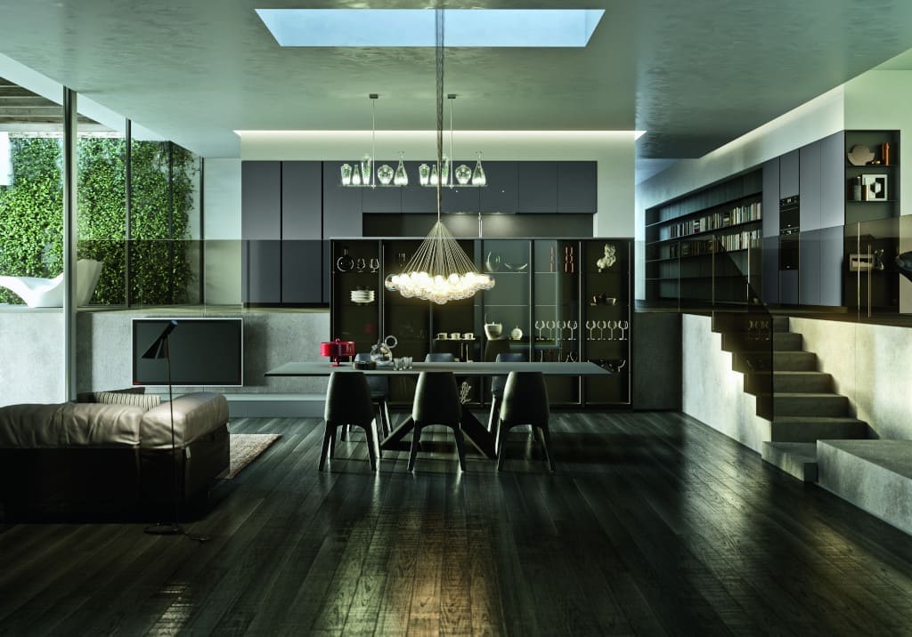 Czarna zabudowa kuchenna „Ak_Project” (prod. Arrital, dystr. Estima) spaja wnętrze stanowiąc eleganckie tło dla będącej centralnym punktem salonu lampy.