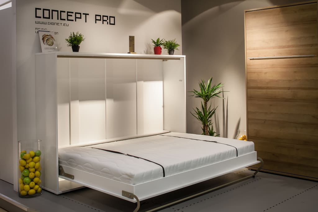 Półkotapczan „Concept Pro” firmy Dig-Net to znany mebel w nowoczesnej odsłonie, który w niedużym pokoju pozwala optymalnie zagospodarować mocno ograniczoną przestrzeń.