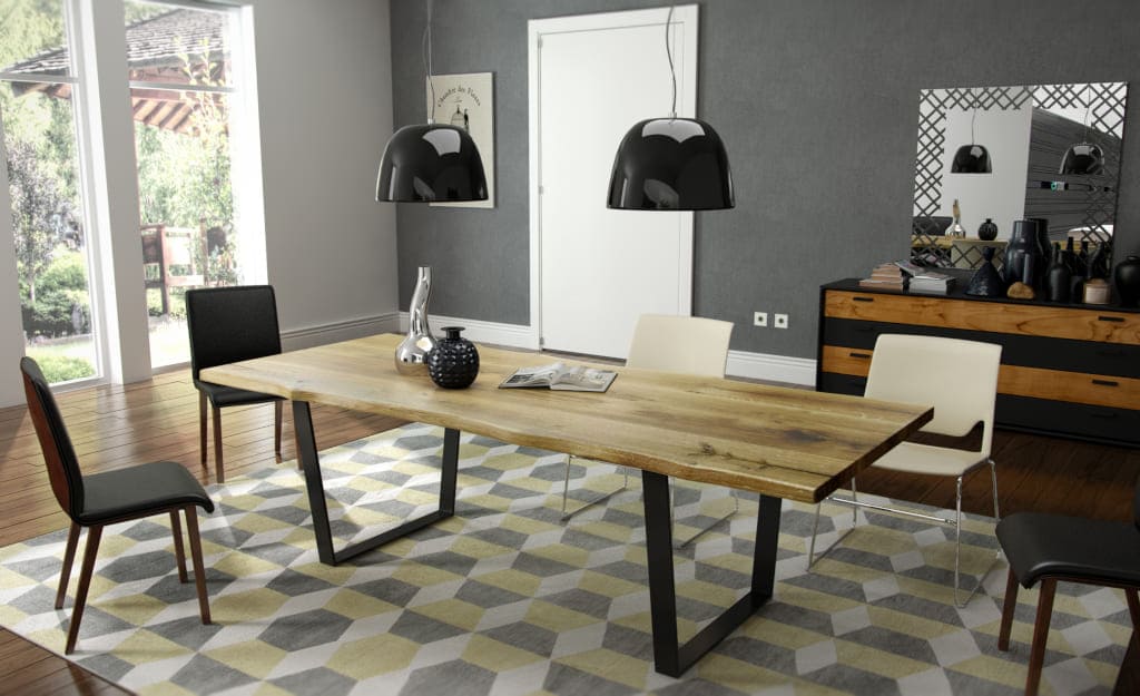 Stół „Avangard” polskiej marki Trebord ma dębowy, olejowany blat o nieregularnym kształcie i nogę w formie „Standard V”, w kolorze czarnym.