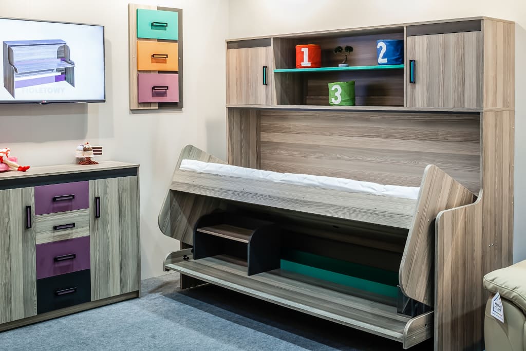 Mebel „Ultimo” firmy Dolmar na funkcjonalnym okuciu „Tavoletto” Häfele.