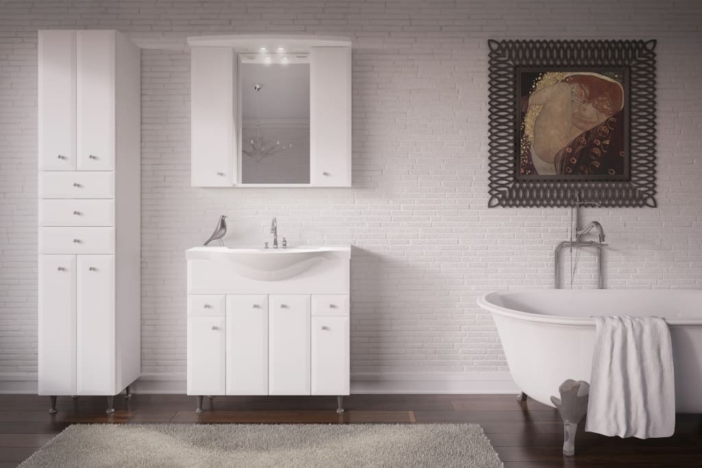 Firma Lupus.eu oferuje meble łazienkowe pod marką Fila. Na zdjęciu przedstawiona jest przykładowa kolekcja z wykorzystaniem frontów o klasycznym wzorze, lakierowanych na biały wysoki połysk.