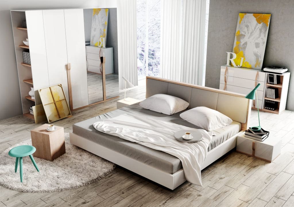 Połyskujące bielą meble „Snow” firmy Dignet Lenart ozdobiono oryginalnymi uchwytami z litego drewna, które nadają tej kolekcji nietuzinkowy charakter.