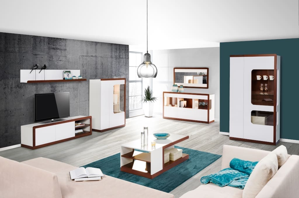 W kolekcji „Malta” firmy Szynaka-Meble połyskującą biel połączono z ciemnym wybarwieniem orzecha, co nadało meblom wyrazistości.