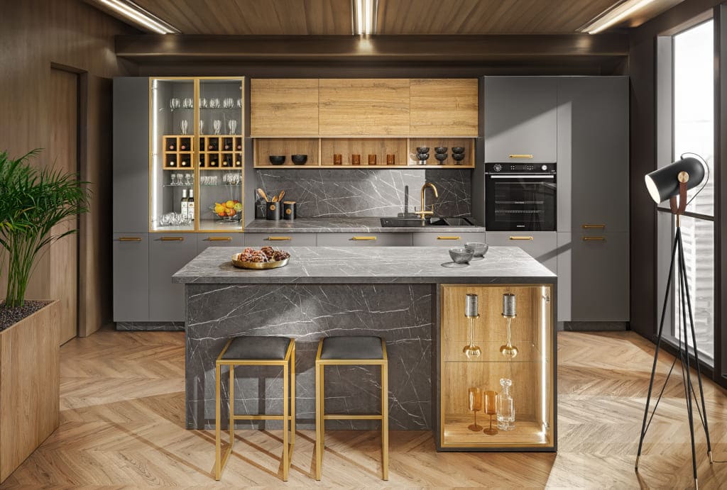 Meble z systemu KAM Premium Plus z dużymi przeszklonymi frontami wyglądają stylowo i elegancko, dzięki czemu kuchnia nabiera bardziej salonowego charakteru.