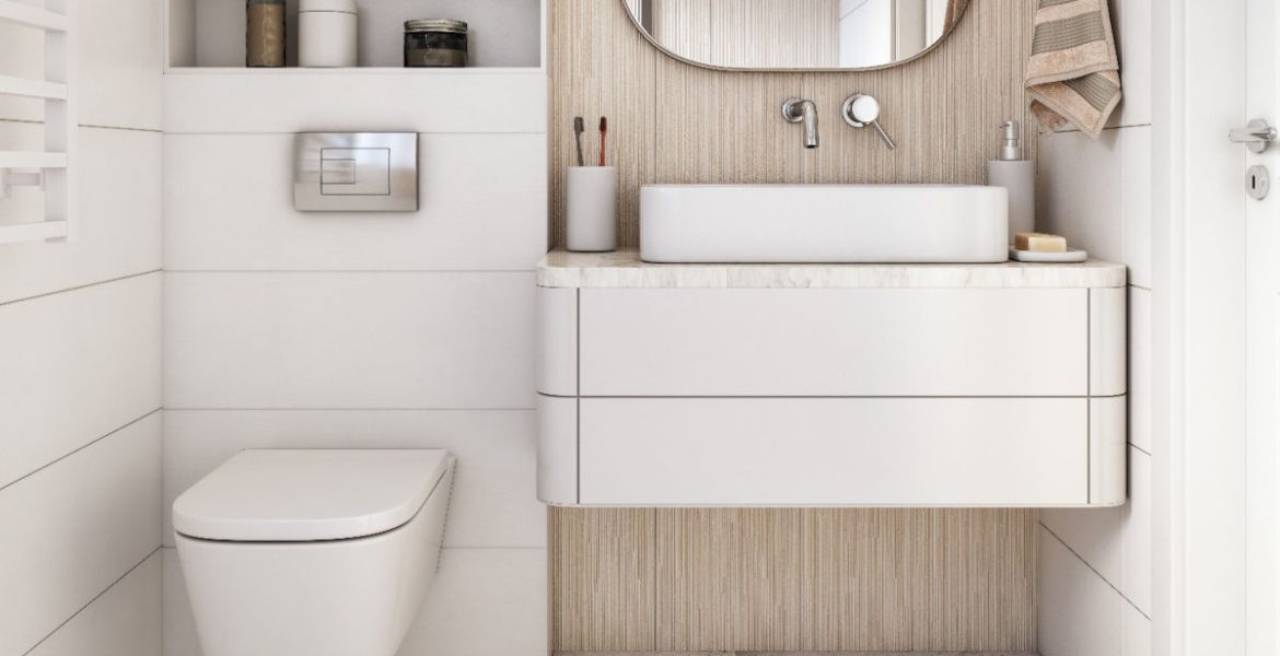 Meble łazienkowe w jasnej, białej łazience.