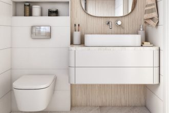 Meble łazienkowe w jasnej, białej łazience.