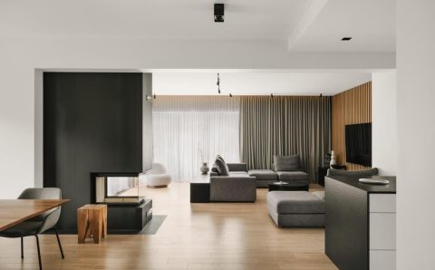 Projekt domu o powierzchni 300 m2 autorstwa pracowni Zimon Studio - widok na salon.