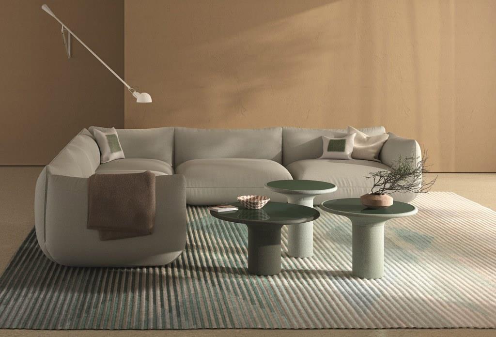 Co eksportować do Niemiec? Jakie meble? Futurystycznie wyglądająca, pokryta tkaniną, miękko wyściełana cylindryczna podstawa stolika bocznego unosi się do góry i ukazuje oczom użytkownika niczym kwiat. W podstawie osadzona jest okrągła, szklana płytka.