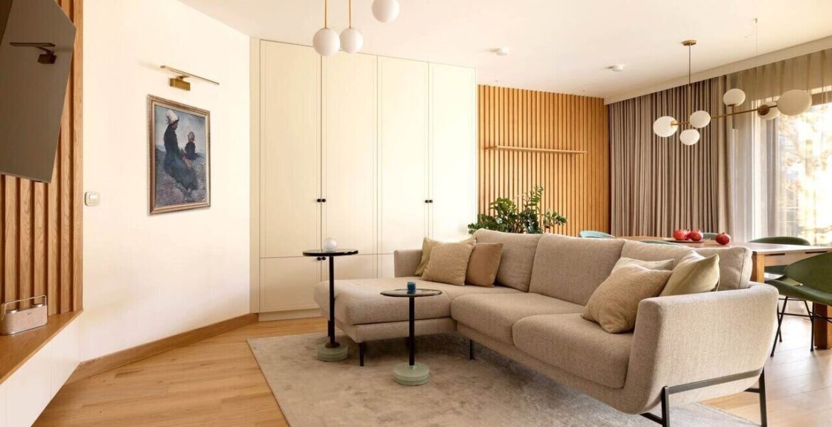 Przestrzeń dzienna w apartamencie w stylu skandynawskim, proj. Grupa Malaga.