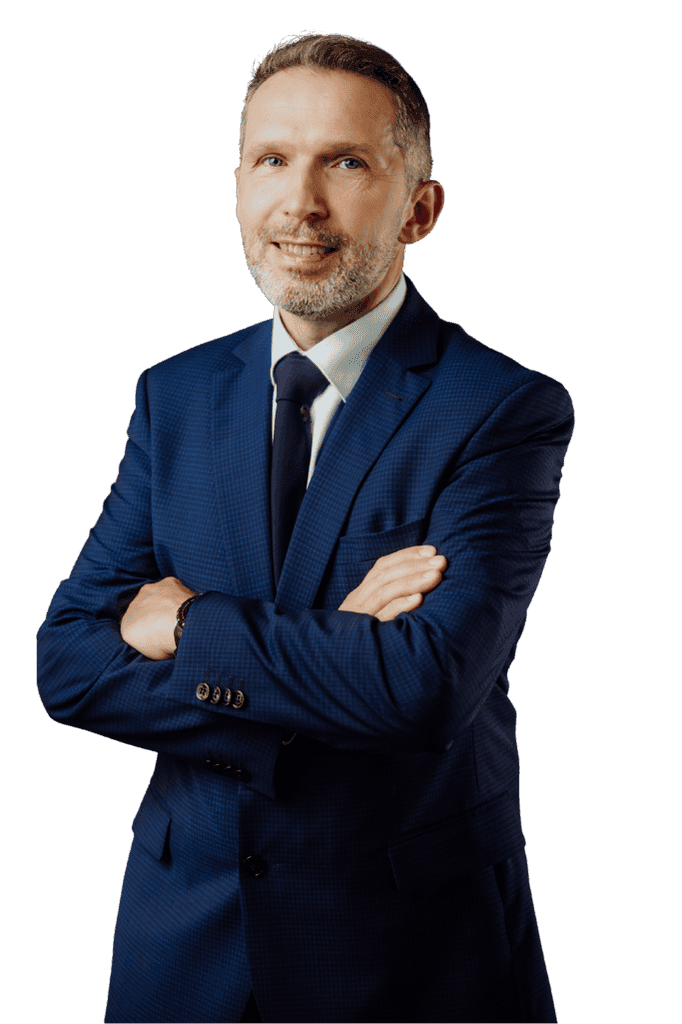 Jan Szynaka podczas wizyty w Woodeco, stojąc obok przedstawicieli firmy