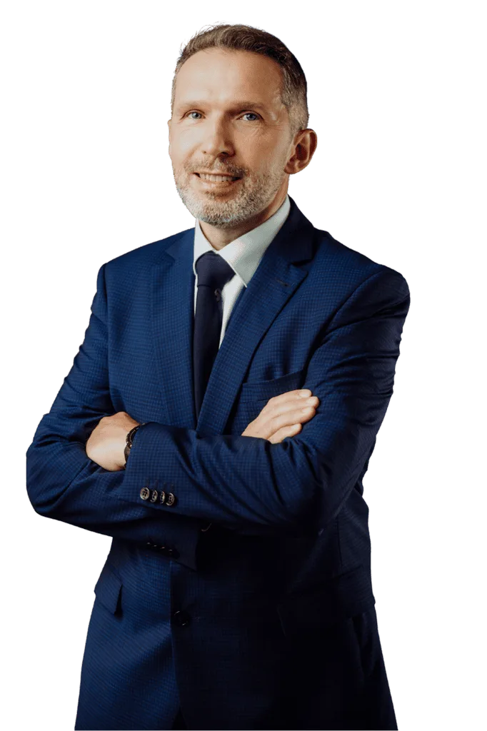 Jan Szynaka podczas wizyty w Woodeco, stojąc obok przedstawicieli firmy