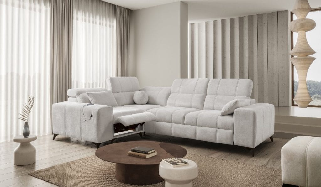 Narożnik Dafine Spring w nowoczesnym salonie – elegancki mebel tapicerowany z funkcją relaksu, projekt PPHU Brattex Kaniewski.