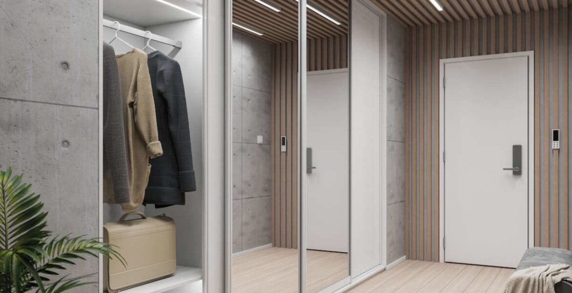 Sevroll - system Gemini 10 wykorzystany w przedpokoju w szafach białych i z lustrami