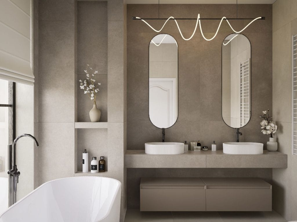 Kolor Mocha Mousse możemy wprowadzić także do łazienki. Ciepły, brązowy odcień podkreśli ciekawą formę białej ceramiki łazienkowej. Fot. Domni.pl