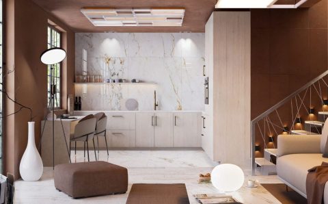 Projekt otwartej strefy dziennej. W tym projekcie zdecydowano się na ściany i dodatki w kolorze Mocha Mousse, które współgrają z jasną podłogą i meblami. Fot. Domni.pl