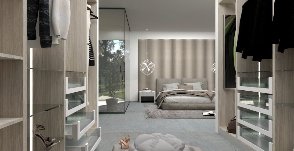 Sevroll - garderoba w jasnych barwach z widocznym łóżkiem