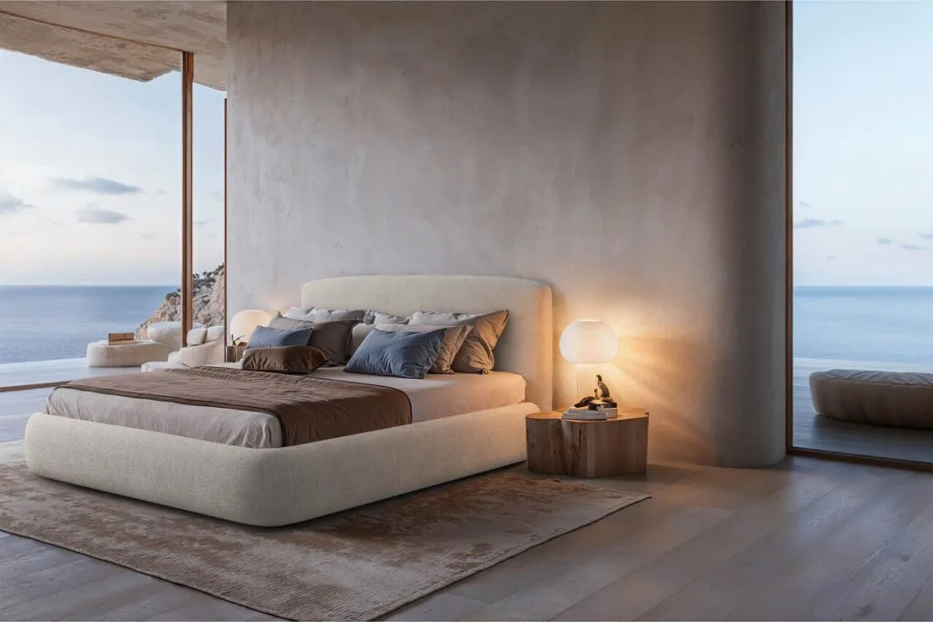 DIUN marki Comforteo zachwyca prostą formą i perfekcyjnie dopracowanymi detalami. Łóżko łączy prostotę z dopracowanymi detalami. Jego delikatnie zaokrąglone krawędzie nadają bryle miękkość, przełamując surowość minimalistycznego designu. Niska rama umieszczona tuż nad ziemią oraz dyskretne wezgłowie tworzą harmonijną, lekką sylwetkę. Inspirowane stylem japońskim i skandynawskim, łóżko DIUN wprowadza do wnętrza spokój i elegancję. Dzięki przemyślanej formie idealnie odnajdzie się w nowoczesnych i minimalistycznych aranżacjach.