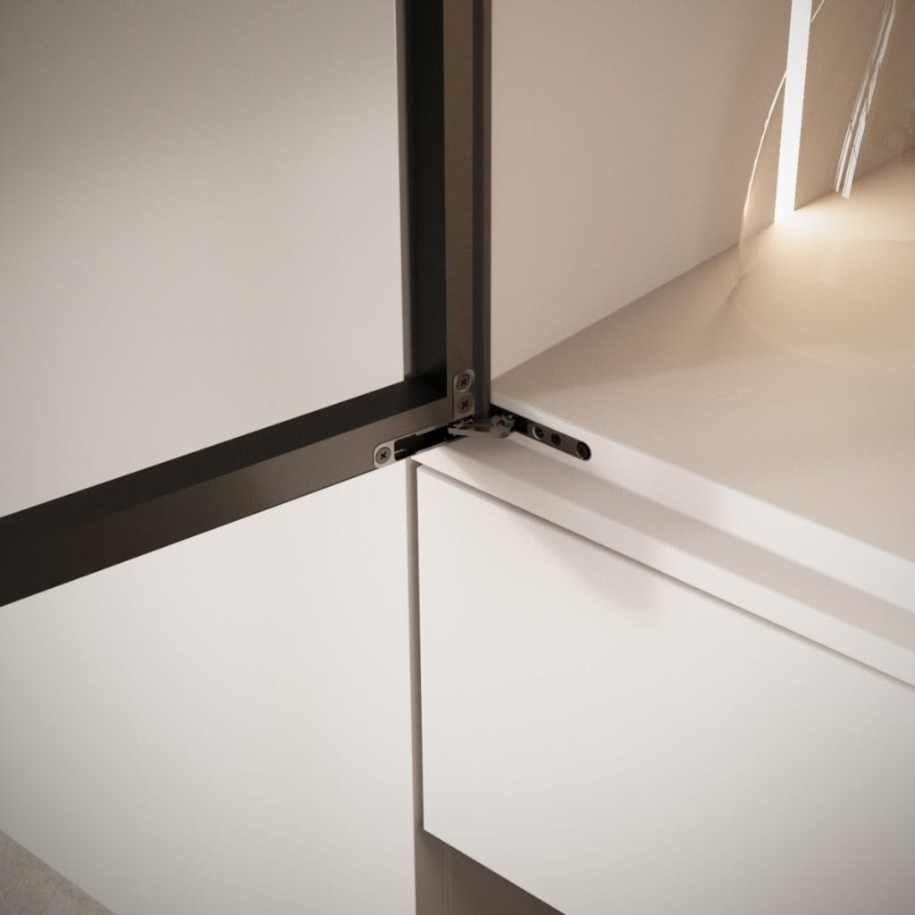 Zbliżenie na ukryty zawias meblowy Sevroll Secret zamontowany w dolnej części szklanego frontu z czarną ramką. Widoczny precyzyjny mechanizm montowany w wieńcu dolnym szafki, podkreślający minimalistyczny design.