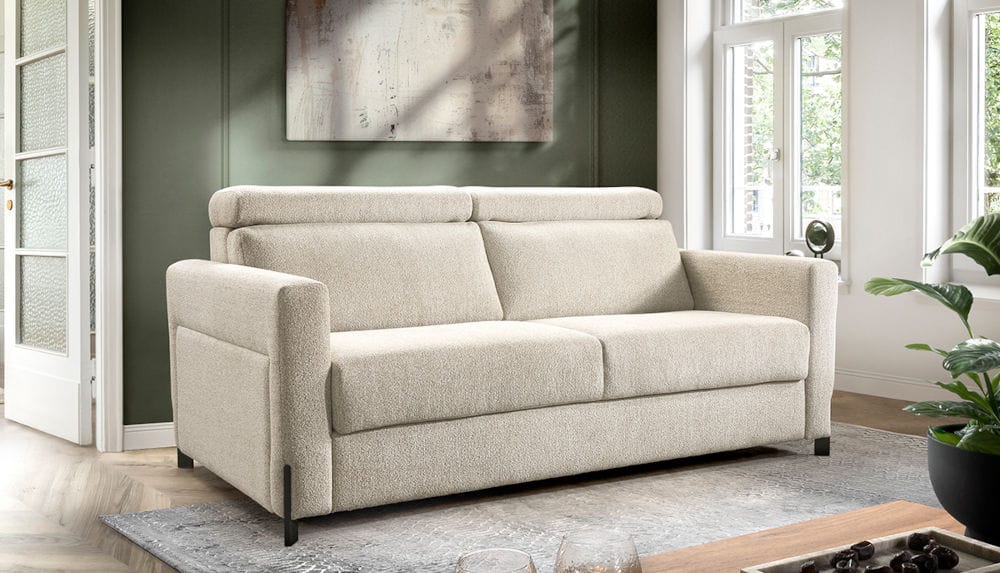 Sofa Elite marki Libro w kolorze kaszmirowym, z funkcją spania i pojemnikiem na pościel.