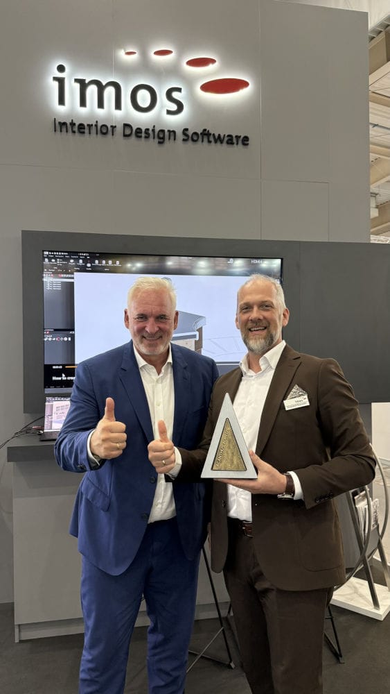 Winifred Dell i Krzysztof Rykowski z nagrodą Acanthus Aureus za Imos iX 2025 podczas targów DREMA 2025