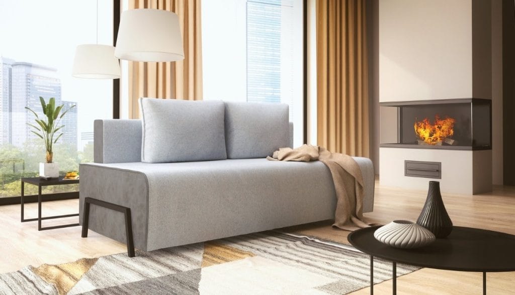 Sofa rozkładana Libro GOLDY – wygodne spanie w kawalerce i elegancki wygląd w małym wnętrzu.