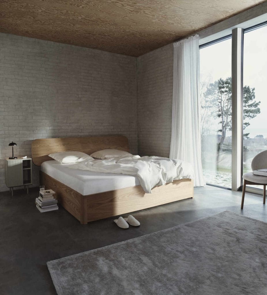 Kolekcja Element jest odpowiedzią na współczesne zapotrzebowanie na wszechstronne i stylowe rozwiązania, które pasują do elastycznych przestrzeni mieszkalnych. Wraz z rozwojem wielopokoleniowych gospodarstw domowych i rolą „mikroapartamentów”, BoConcept wprowadza w pełni modułową, konfigurowalną kolekcję, w której priorytetem są zarówno funkcjonalność, jak i estetyka. Każdy element łóżka można dostosować (na setki sposobów) do osobistego gustu i specyfikacji, więc istnieje szansa na stworzenie prawdziwie osobistej przestrzeni. Na zdjęciu łóżko Element w fornirze w kolorze naturalnego dębu.