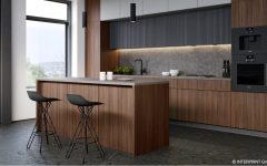 Nowoczesna kuchnia w ciemnej tonacji z wykorzystaniem dekoru Interprint Epona Walnut na frontach szafek i wyspie kuchennej. Aranżacja z szarymi, kamiennymi blatami, czarnymi akcentami i hokerami w stylu industrialnym.