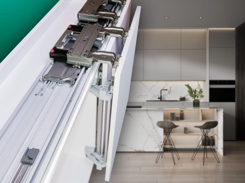 System przesuwny do drzwi meblowych – aluminiowa prowadnica i wózki jezdne w zabudowie kuchennej.