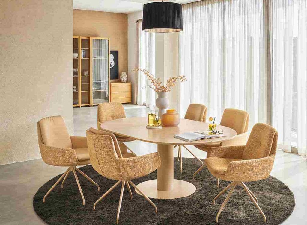 Ton w ton, czyli kolorystyczne dopasowanie nóg krzesła i stołu jadalnego tworzy wyjątkowo harmonijną atmosferę w salonie. Fot. 3C. Źródło: VDM.