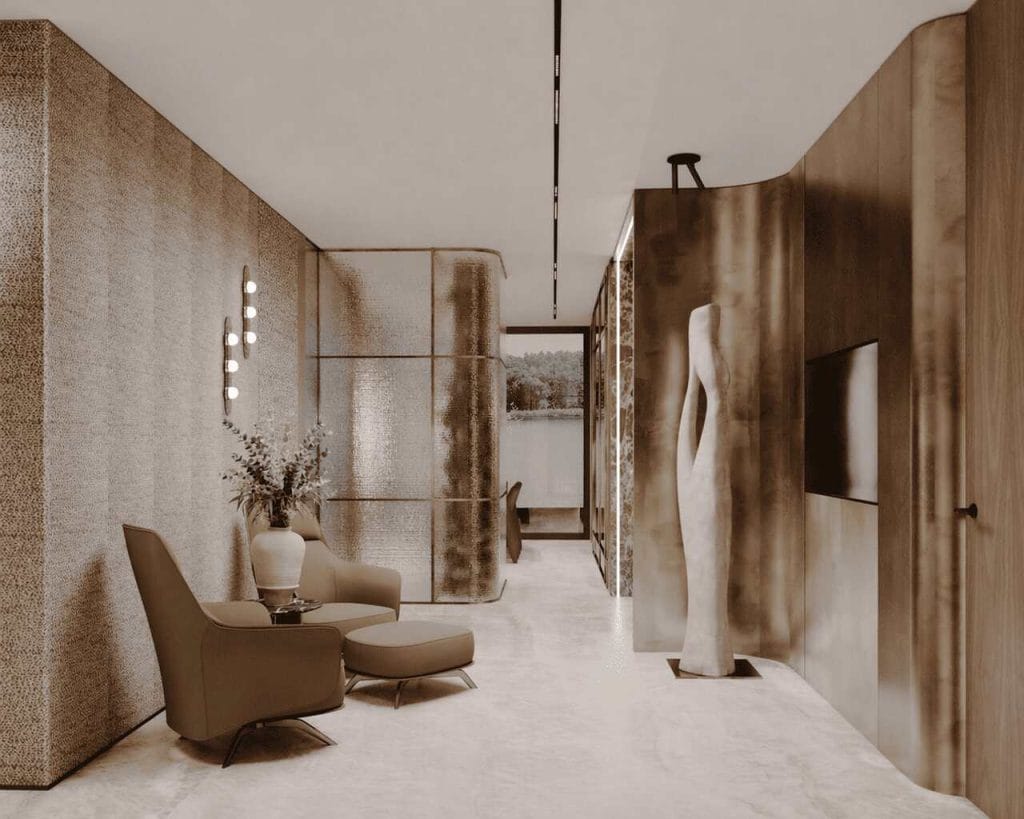 Kącik relaksu: Designerski fotel na tle strukturalnej ściany, gdzie rzeźbiarskie formy mebli spotykają się z artystycznym oświetleniem.