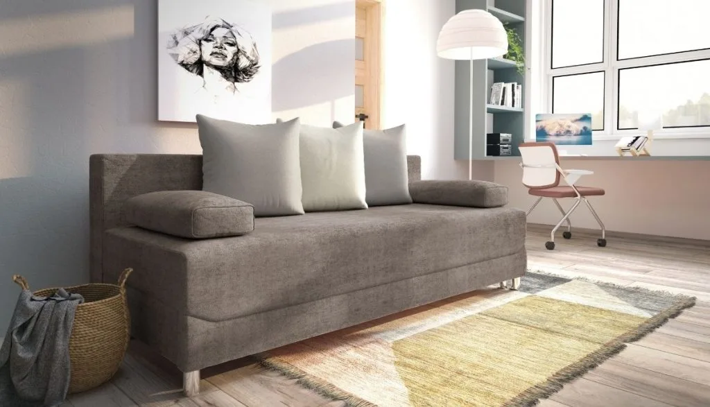 Beżowo-szara rozkładana sofa do salonu Libro Alisa z poduszkami oparciowymi.
