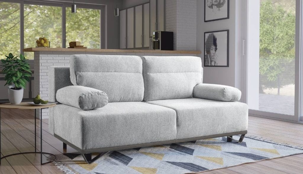 Jasnoszara dwuosobowa sofa do salonu Libro Chester na nowoczesnych nóżkach.